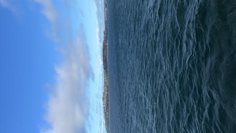 Looking-back-across-the-horizon-from-the-ferry-crossing-the-sea-near-Seattle