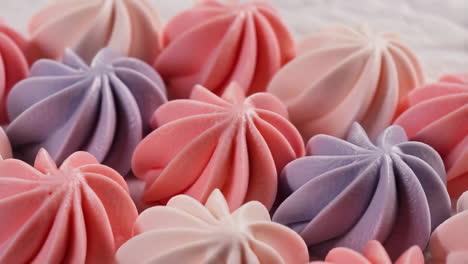 close-up of pastel meringue cookies