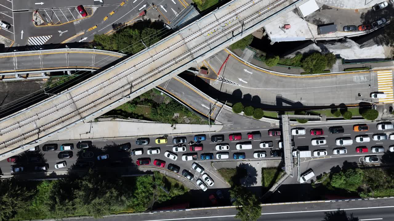 Zoom-in aerial shot of the Santa Fe interurban train tracks, CDMX
