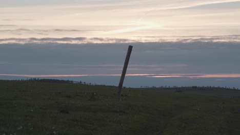 timelapse of the sunset on the countryside. clouds are running and sun is setting down. on the detail heat waves are visible.