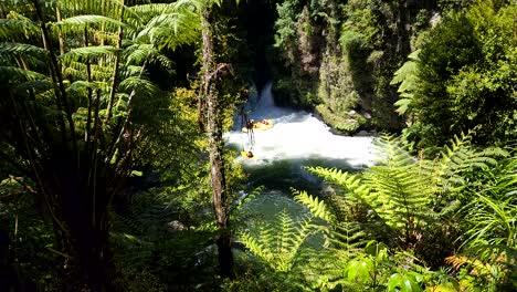 tourists doing white water rafting in rotorua new zealand