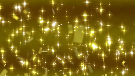 Animation-of-falling-golden-confetti-over-gold-background