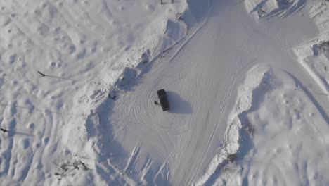 panning over a car-driver. winter. trysil, norway