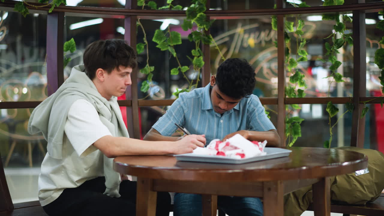 Wide shot capturing beautiful eatery structure with ornate wooden beams glass windows bustling interior activity with chefs preparing meals servers moving dishes diners enjoying vibrant ambience