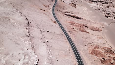 Atacama-Road-Through-Desert-Vast-Dry-Extensions-Aerial-Drone-Above-Sand-Infinite-Driest-Area-of-Chile,-Adventure,-South-American-Travel-Destination