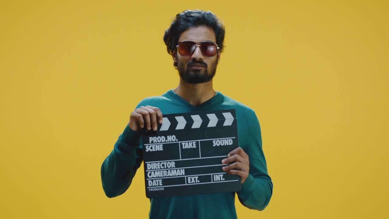 bored African American Man Doomscrolling on Smartphone in Bed Shot of Bored African American Man Doomscrolling on his Smartphone while Lying in Bed