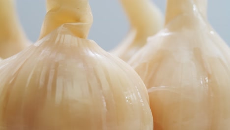 whole fermented garlic, fermented pickled vegetables. high quality 4k footage