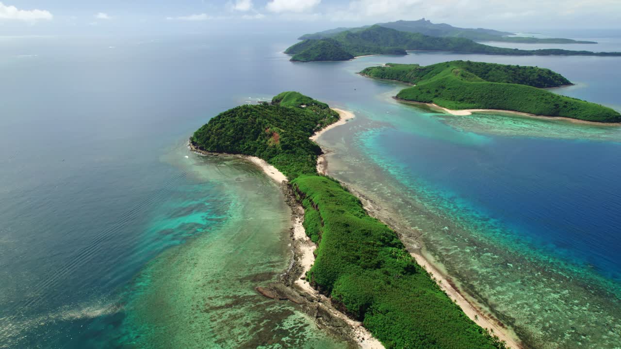 Yasawa islands, Fiji and it's turquoise coral reefs, reveal shot