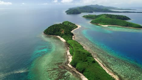 Yasawa-islands,-Fiji-and-it's-turquoise-coral-reefs,-reveal-shot