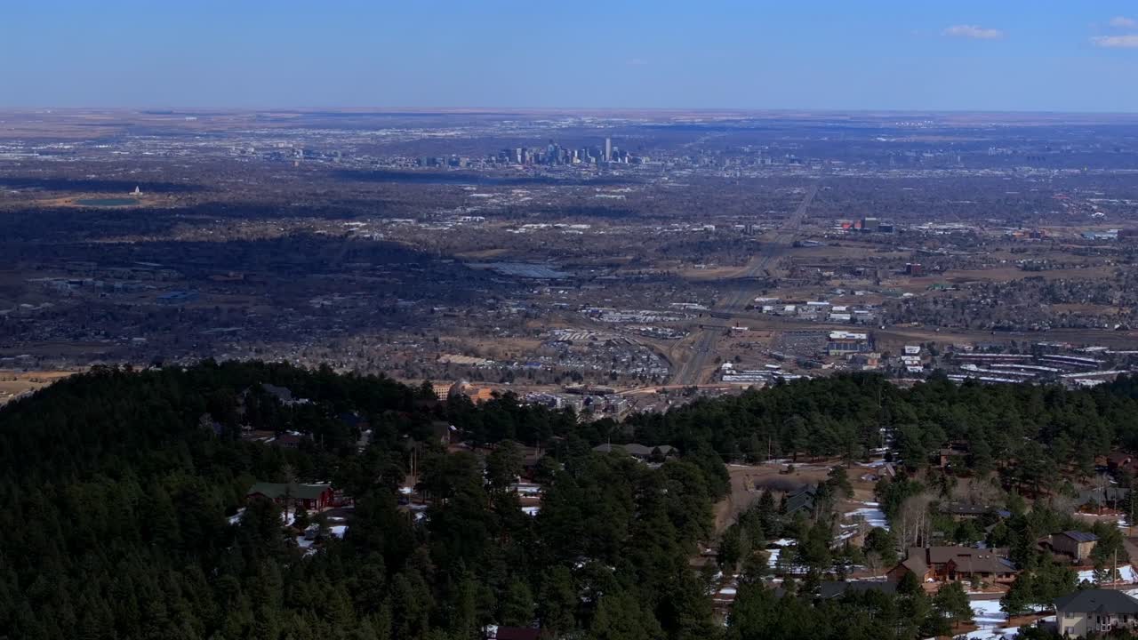 Lookout Mountain Golden Colorado aerial drone Downtown Denver cityscape from North Table Mesa daytime winter sunny clouds neighborhood Front Range Rocky Mountains Arvada Lakewood parallax right motion
