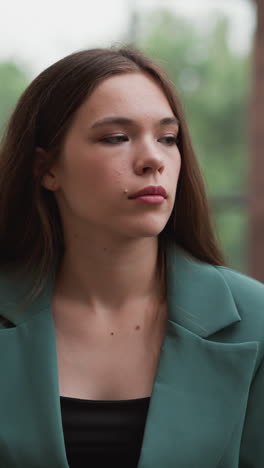 woman in formal suit unwinds on swings. businesswoman seeks relief from toll of relentless decision-making at work. stress of intricate financial negotiations