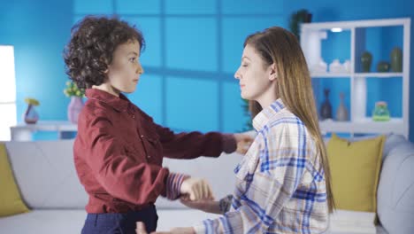 The-mother-raises-her-son-with-tenderness-and-love-and-hugs-him-and-strokes-his-hair.