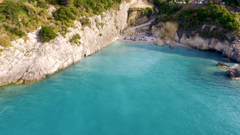 approaching drone shot of xigia, a secluded beach in the island of zakynthos island known for its sulphurous springs and marine caves in greece