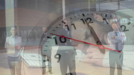 animation of ticking clock over portrait of diverse businesspeople crossing arms standing at office