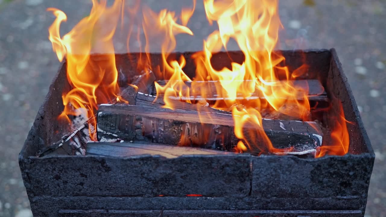 Handmade metal box burning dry wood, mobilization and wartime production