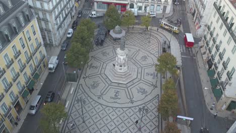 aerial backwards view of camões square in chiado lisbon portugal