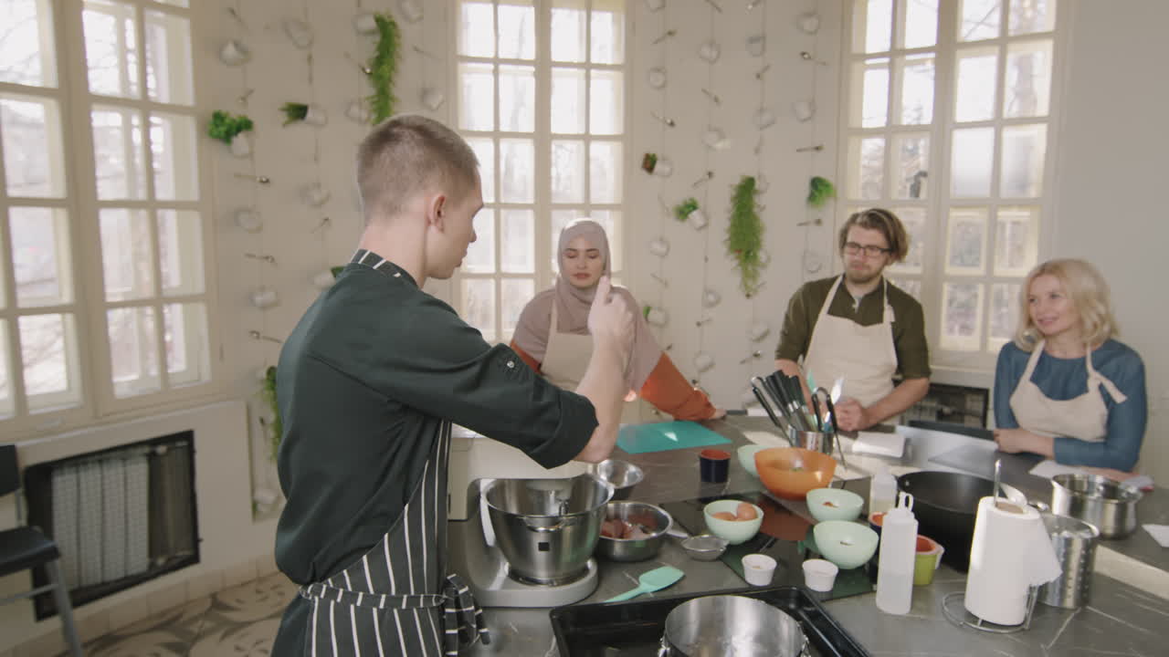 Young Chef Giving Cooking Class