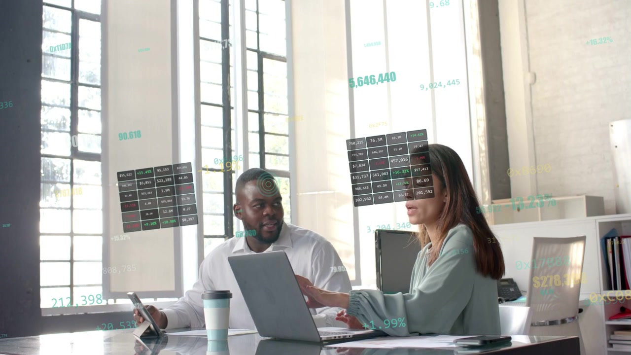 Woman typing laptop, panels appearing between them while man pointing tablet checking finance