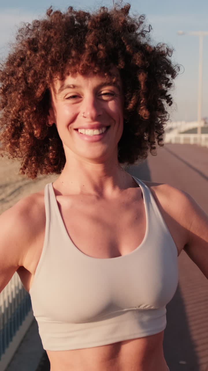 Happy Woman in Sportswear at Beach