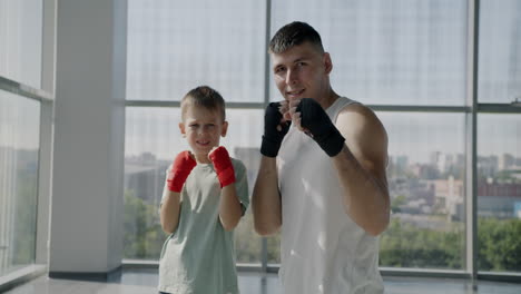 father and son boxing training