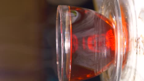 a glass of red liquid