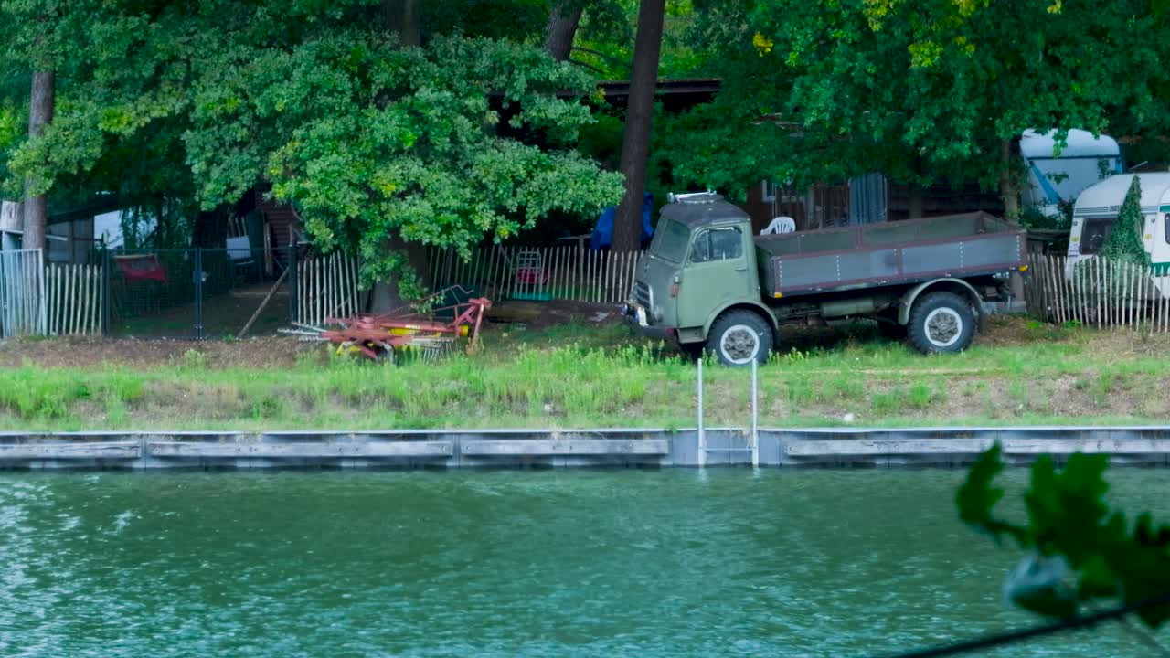 Truck and river scene