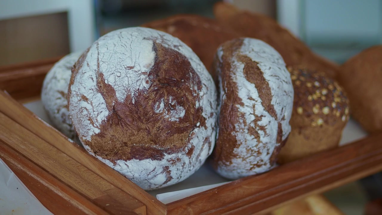 Close-up of Rustic Bread Dusted with Flour in a Bakery