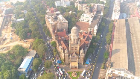 a drone shot of chhatrapati shivaji maharaj terminus and the municipal corporation heritage buildings in the fort area of south bombay