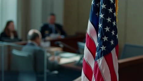 american flag at an official meeting