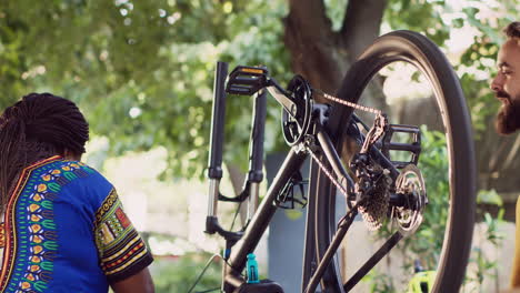 motivated couple fixing damaged bicycle