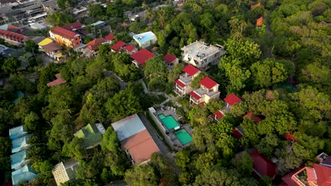 slow motion cinematic drone reveal of beautiful beach resort and ocean