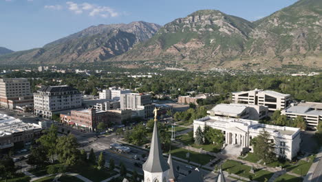 Aerial-flyover-above-the-city-center-and-LDS-Mormon-Temple-in-Provo,-Utah