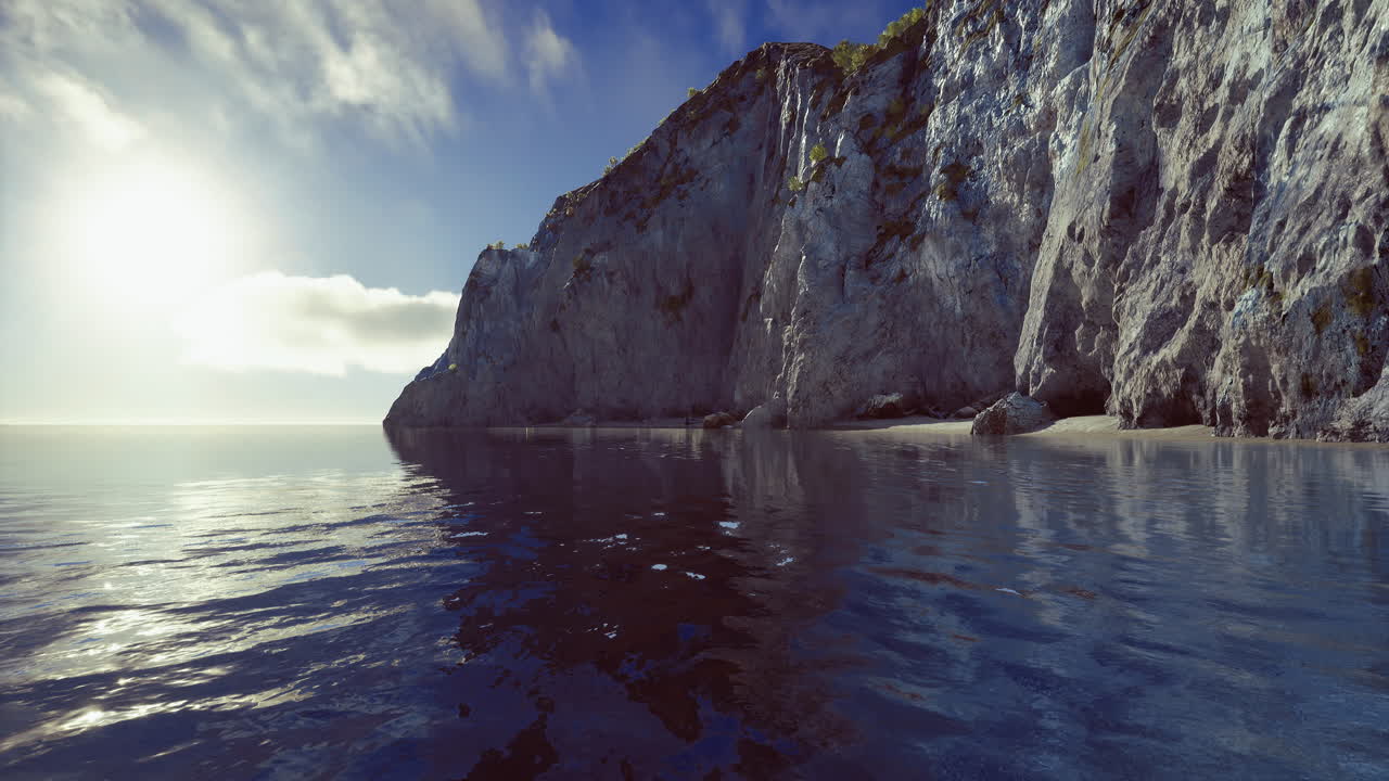 Serene coastal cliffs reflect on calm waters during a tranquil morning