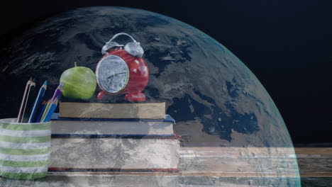animación de una pila de libros con manzana y despertador vintage en todo el mundo