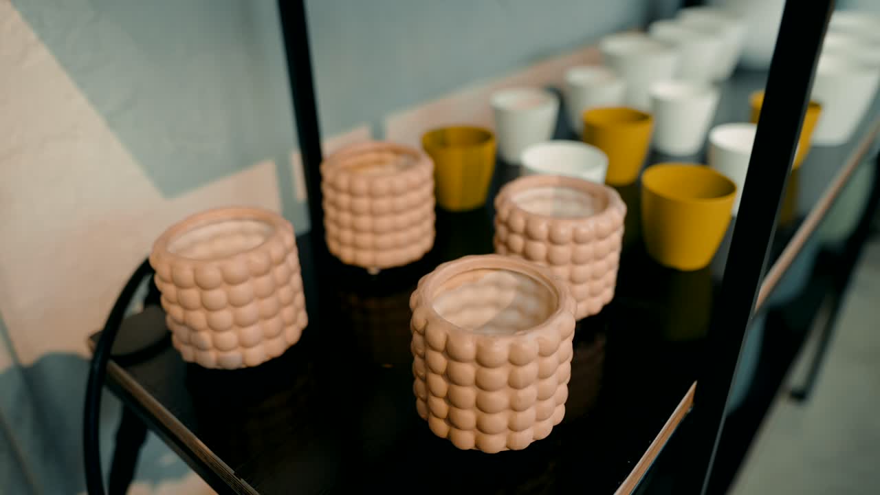 Cups and ceramics on a shelf