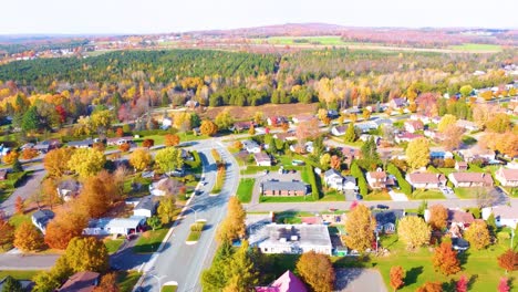 aerial view of residential homes in suburbs of estrie, québec, canada in autumn