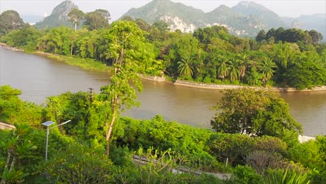 scenic view over river kwai with green lush area in thailand