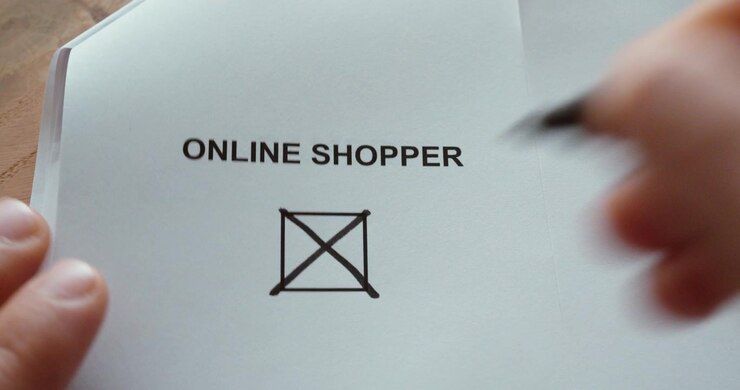 Close-up of a person marking an “Online Shopper” checkbox with a pen, representing ecommerce, digital shopping, consumer behavior and online purchasing.