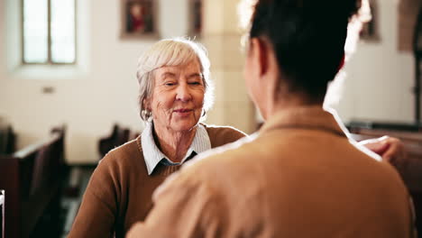 an elderly woman receiving support and prayer in a church
