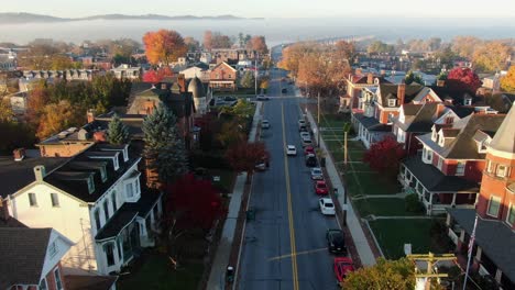 Aerial-establishing-shot-of-Victorian-and-Colonial-homes-in-small-town-neighborhood-in-Northeast-USA