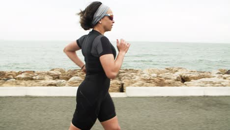 serious female triathlete training for marathon