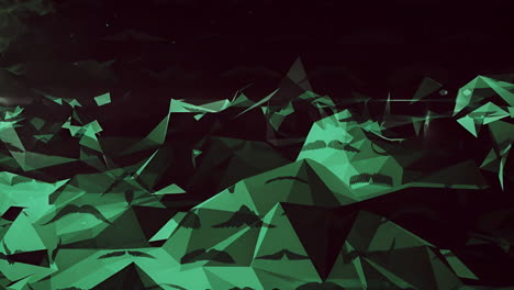 animating abstract green polygonal mountains over dark background, copy space