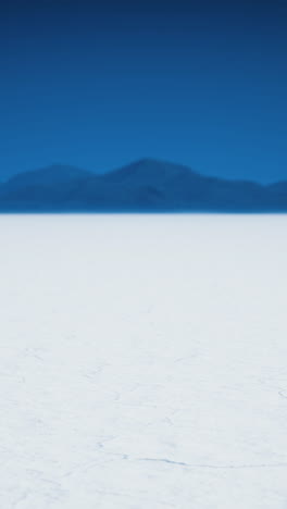 stunning view of salt flats under a blue sky