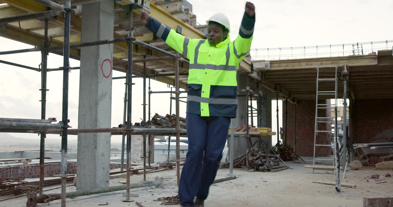 Construction Worker Dancing Happily on Building Site