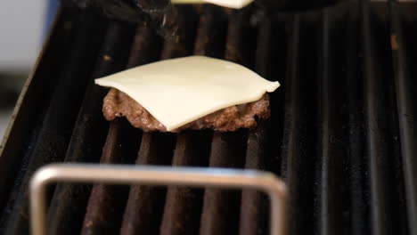 sizzling perfection: cheese melting on the grill