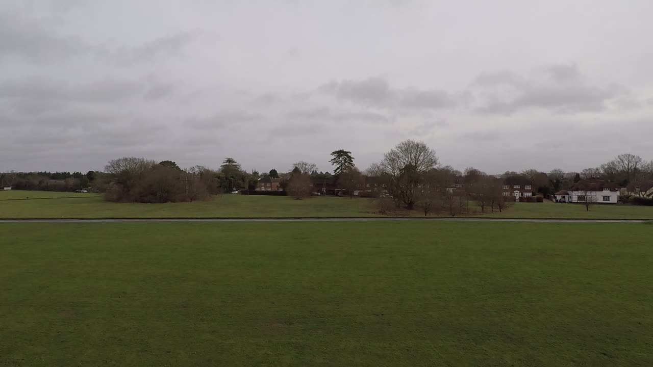 An overhead shot over a small English country village on a cold winter day-6
