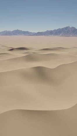 vast desert landscape with sand dunes and mountains