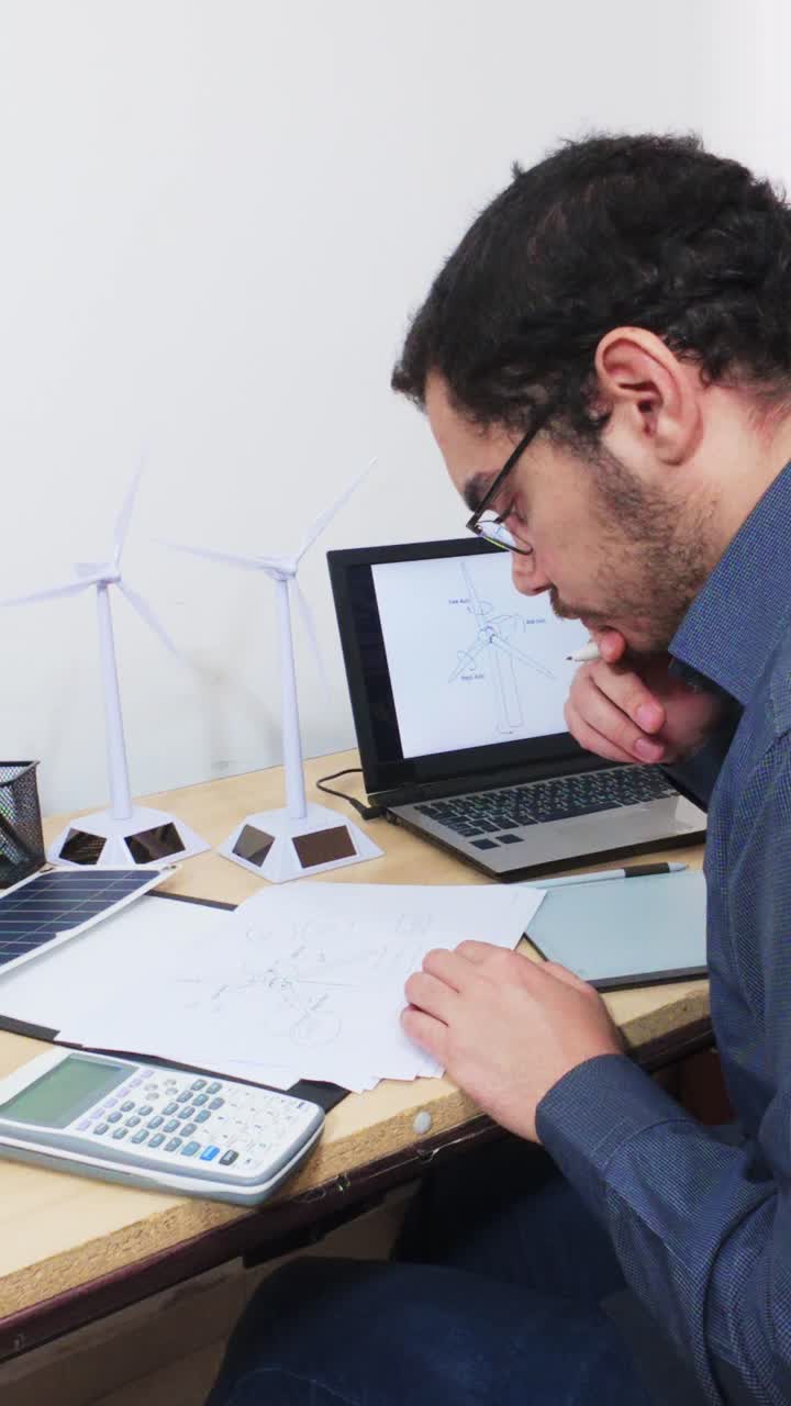 Engineer Organizing and Reviewing Project Design Documents