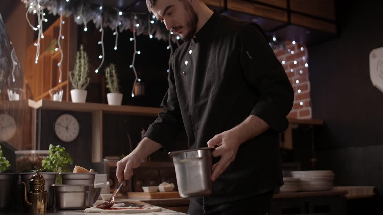 Chef Making Pizza in a Restaurant