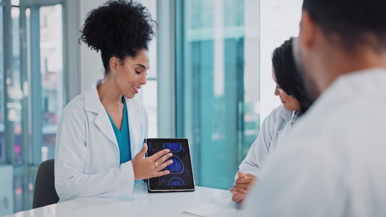 Medical Professionals Discussing Brain Scans